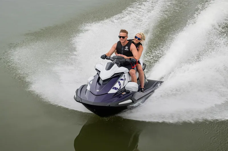 Slide: The Image of Manufacturer Provided Image: 2026 Yamaha WaveRunner FX Cruiser SVHO on water with two riders enjoying a ride. - 5