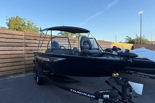 The Image of 2026 Tracker Pro Guide V-175 WT boat on trailer, parked outdoors. - 0