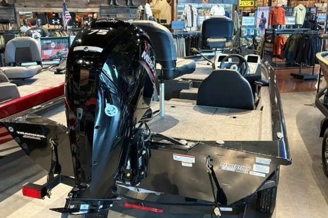 Slide: The Image of 2026 Tracker Pro Team 175 boat with Mercury 75 engine displayed indoors. - 52
