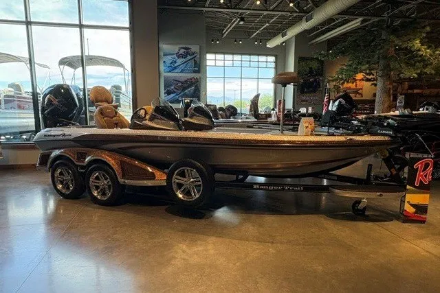 The Image of 2026 Ranger Z520R Cup-Equipped boat displayed in a showroom with sleek design and modern features. - 0