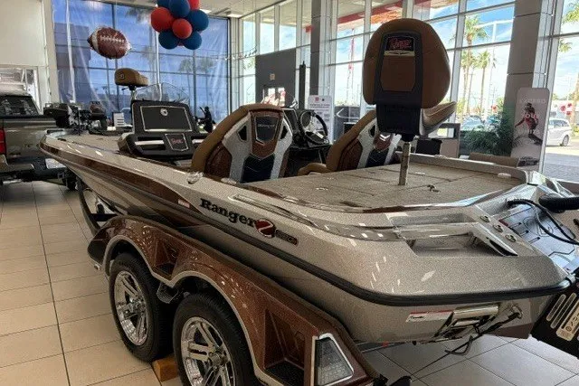 Slide: The Image of 2026 Ranger Z520R Cup-Equipped boat displayed in showroom with modern design and features. - 7
