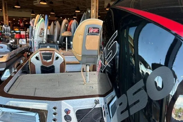 Slide: The Image of 2026 Ranger Z520R Cup-Equipped boat interior with powerful engine, displayed in showroom. - 3