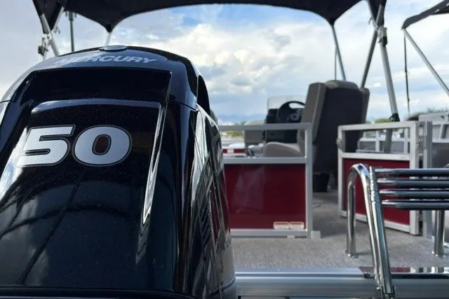 Slide: The Image of 2026 Sun Tracker Bass Buggy 16 XL Select pontoon boat with Mercury 50 engine. - 3