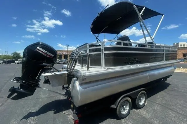 Slide: The Image of 2026 Sun Tracker Fishin' Barge 20 DLX pontoon boat with Mercury outboard motor. - 3