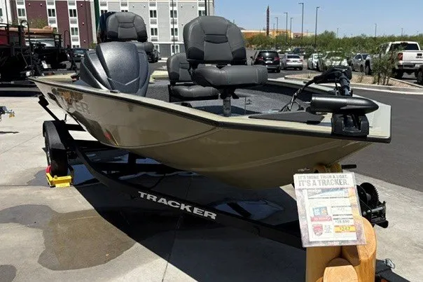 The Image of 2026 Tracker Pro Team 175 Crappie Edition boat displayed outdoors on a trailer. - 0