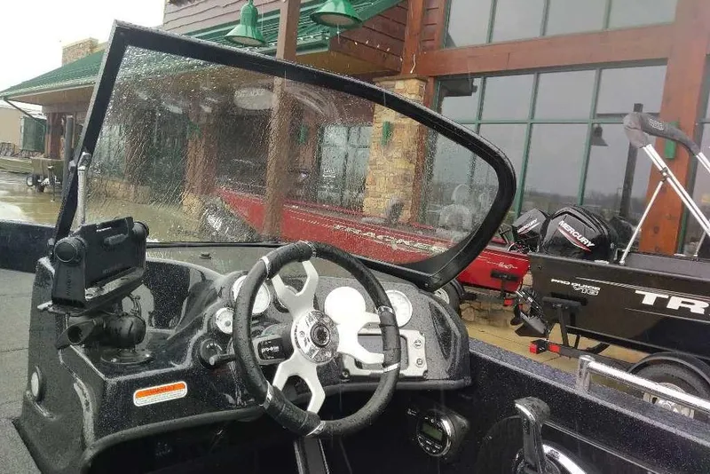 Slide: The Image of Interior view of a 2026 Nitro ZV19 Sport Pro boat with steering wheel and dashboard. - 75