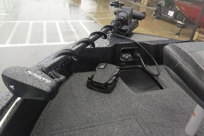 Slide: The Image of 2026 Nitro ZV19 Sport Pro boat with Garmin equipment on a rainy day. - 76