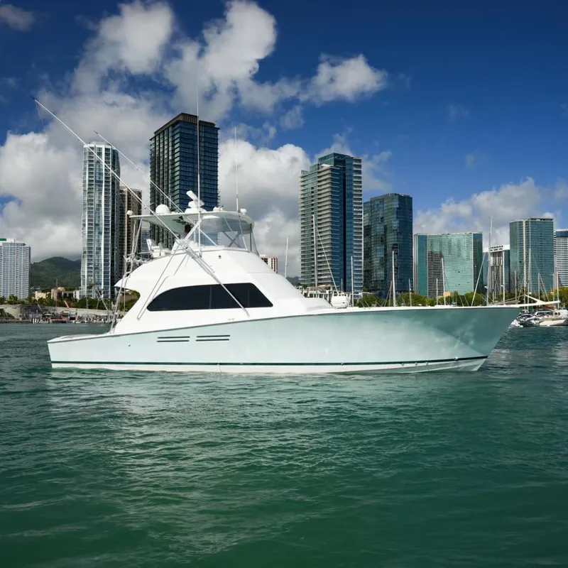 The Image of 1998 Post 50 yacht on water with skyscrapers in background. - 0