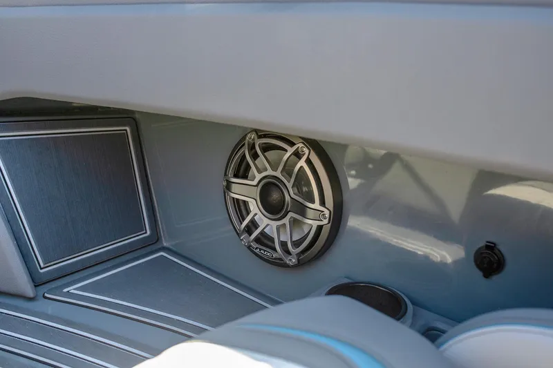 Slide: The Image of 2024 MTI 390X boat interior with speaker and sleek design elements. - 11