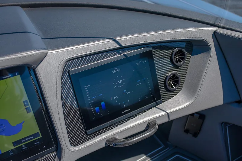 Slide: The Image of 2024 MTI 390X dashboard with touchscreen display and air vents. - 14