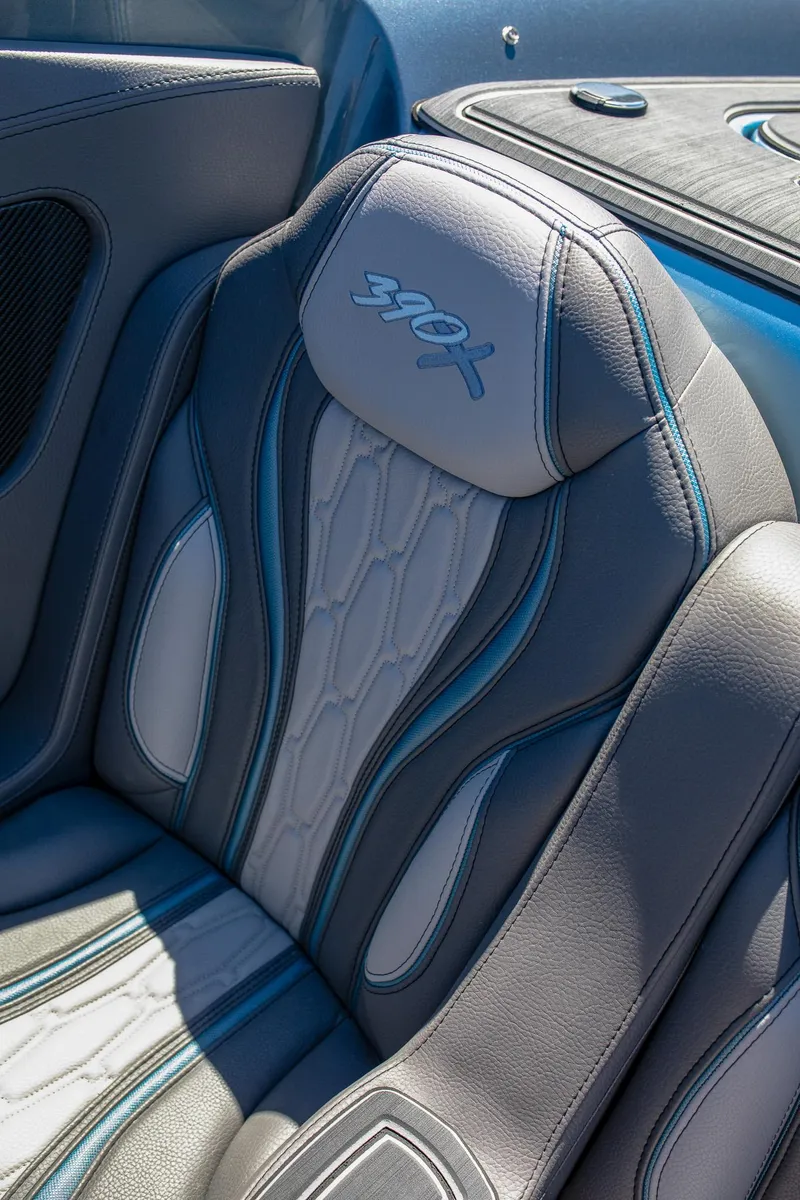 Slide: The Image of 2024 MTI 390X luxury boat seat with sleek design and stitching details. - 19