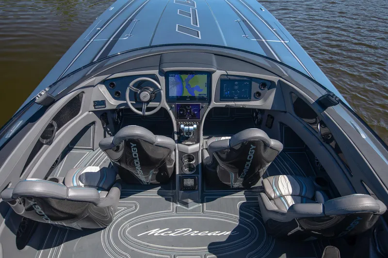 Slide: The Image of 2024 MTI 390X boat interior with advanced navigation system and luxury seating. - 21