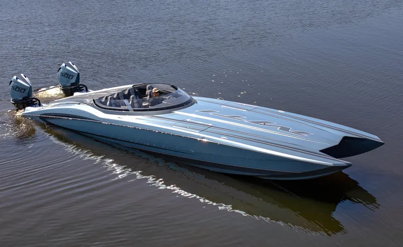 Slide: The Image of 2024 MTI 390X powerboat with dual engines cruising on calm water. - 4