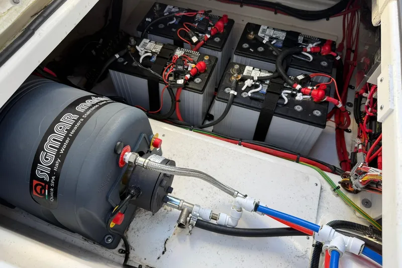 Slide: The Image of Electrical system and water heater in 2025 Navan C30 boat engine compartment. - 32