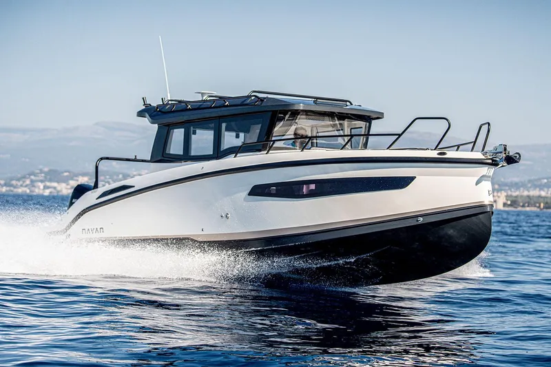 Slide: The Image of Manufacturer Provided Image: 2025 Navan C30 boat cruising on open water, showcasing sleek design and modern features. - 43