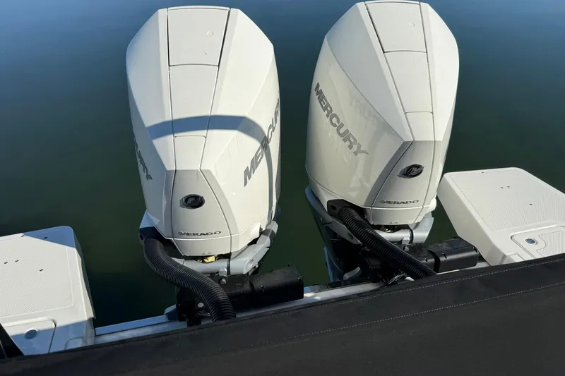 Slide: The Image of Twin Mercury outboard engines on a Navan C30 boat, 2025 model. - 6