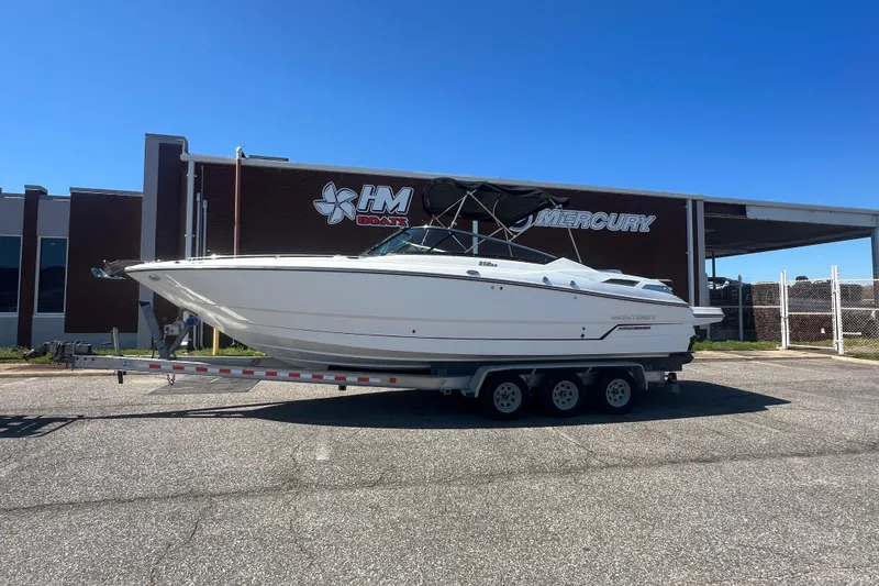 The Image of 2017 Monterey 298SS Super Sport boat on trailer outside HM Boats dealership. - 0
