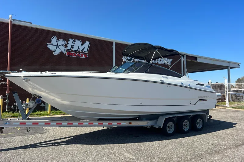 Slide: The Image of 2017 Monterey 298SS Super Sport boat on trailer at HM Boats dealership. - 1