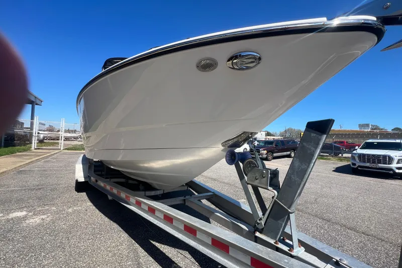 Slide: The Image of 2017 Monterey 298SS Super Sport boat on trailer in parking lot. - 19