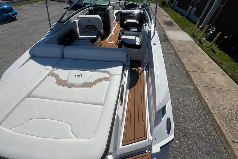 Slide: The Image of 2017 Monterey 298SS Super Sport boat with sleek white and brown interior design. - 26