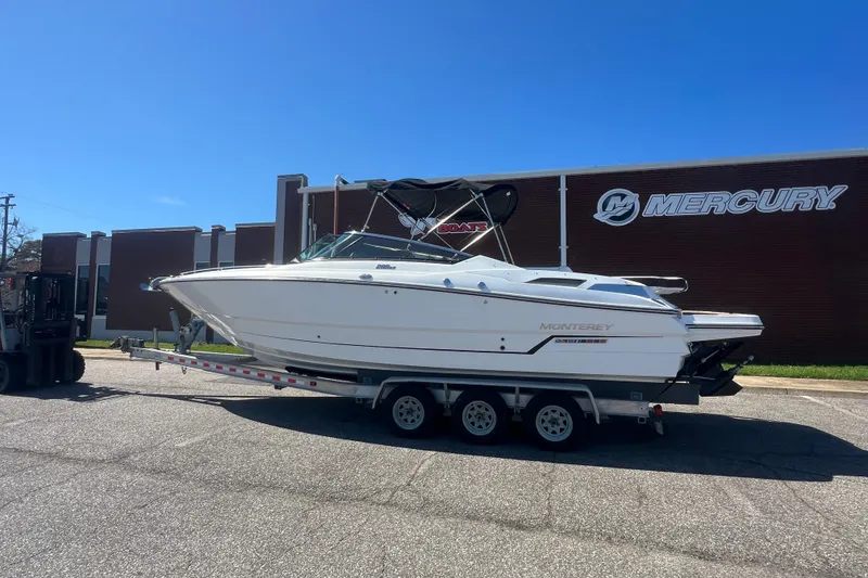 Slide: The Image of 2017 Monterey 298SS Super Sport boat on trailer outside Mercury building. - 3