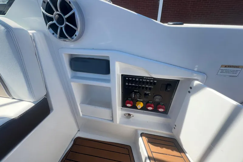 Slide: The Image of 2017 Monterey 298SS Super Sport boat interior with control panel and speaker. - 30