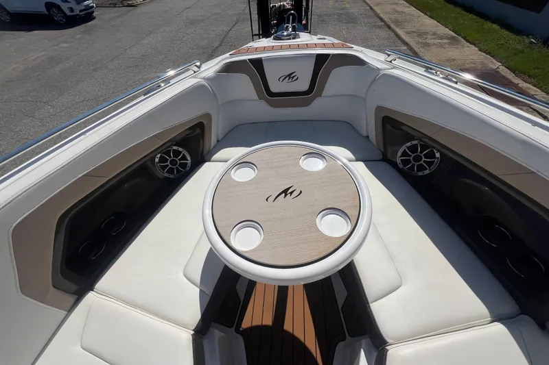 Slide: The Image of 2017 Monterey 298SS Super Sport boat interior with seating and table. - 40