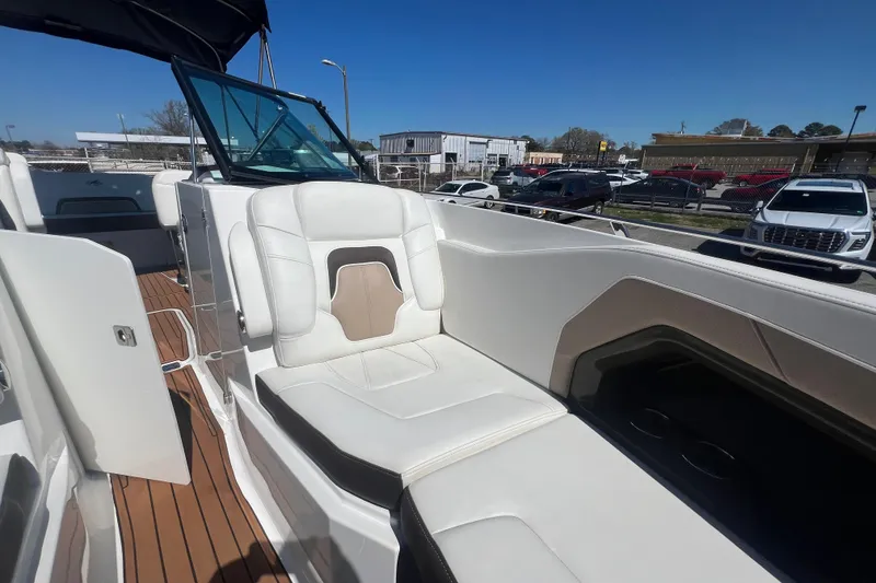 Slide: The Image of 2017 Monterey 298SS Super Sport boat with white seating and wooden deck. - 41