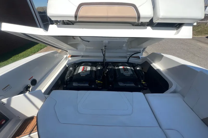 Slide: The Image of 2017 Monterey 298SS Super Sport boat engine compartment with dual engines visible. - 58