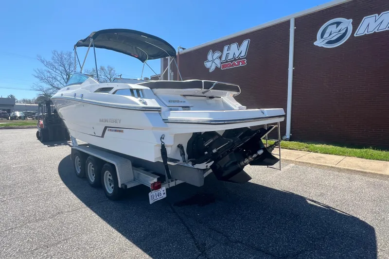Slide: The Image of 2017 Monterey 298SS Super Sport boat on trailer outside HM Boats building. - 6
