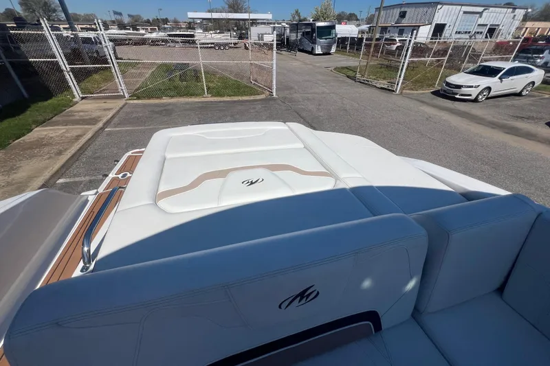 Slide: The Image of 2017 Monterey 298SS Super Sport boat interior with white seating and outdoor view. - 60