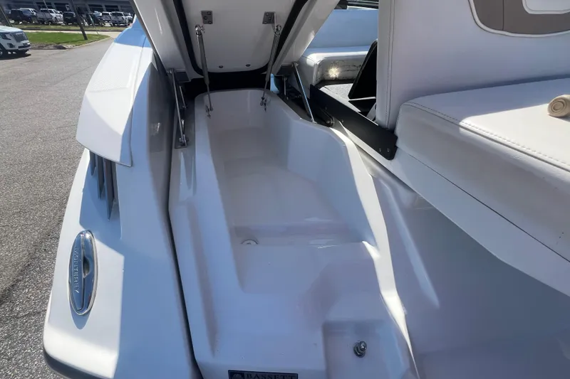 Slide: The Image of 2017 Monterey 298SS Super Sport boat interior with open storage compartment. - 61