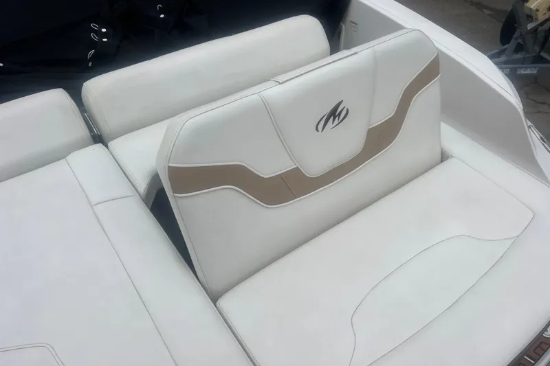 Slide: The Image of 2017 Monterey 298SS Super Sport boat interior with white and beige seating. - 66