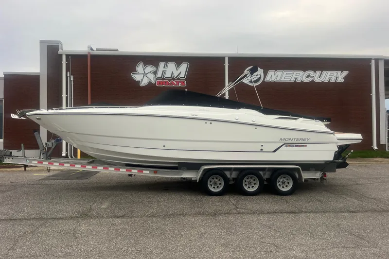 Slide: The Image of 2017 Monterey 298SS Super Sport boat on trailer outside HM Boats and Mercury building. - 70