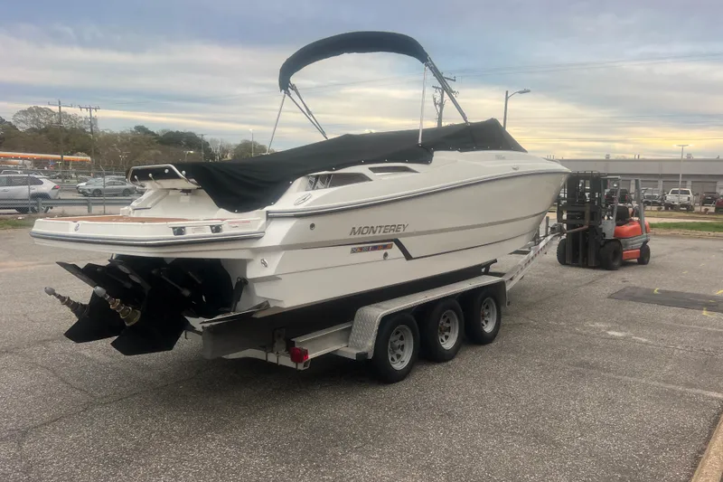 Slide: The Image of 2017 Monterey 298SS Super Sport boat on trailer in parking lot. - 72