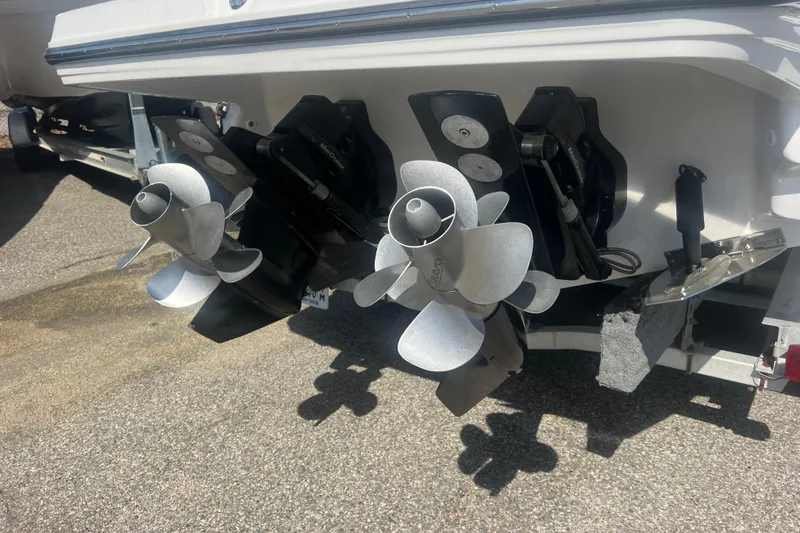 Slide: The Image of Twin propellers of a 2017 Monterey 298SS Super Sport boat on a trailer. - 73