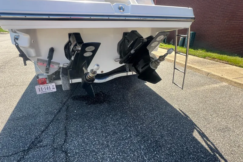 Slide: The Image of 2017 Monterey 298SS Super Sport boat stern with dual propellers and ladder. - 9