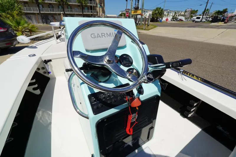 Slide: The Image of 2014 Maverick 17 HPX Tunnel boat console with Garmin navigation system. - 15