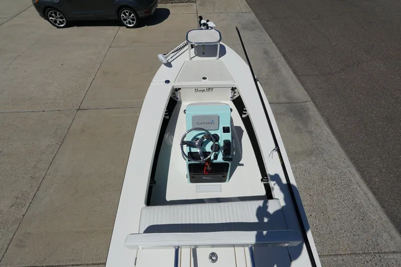Slide: The Image of 2014 Maverick 17 HPX Tunnel boat with Garmin navigation, parked on concrete. - 8