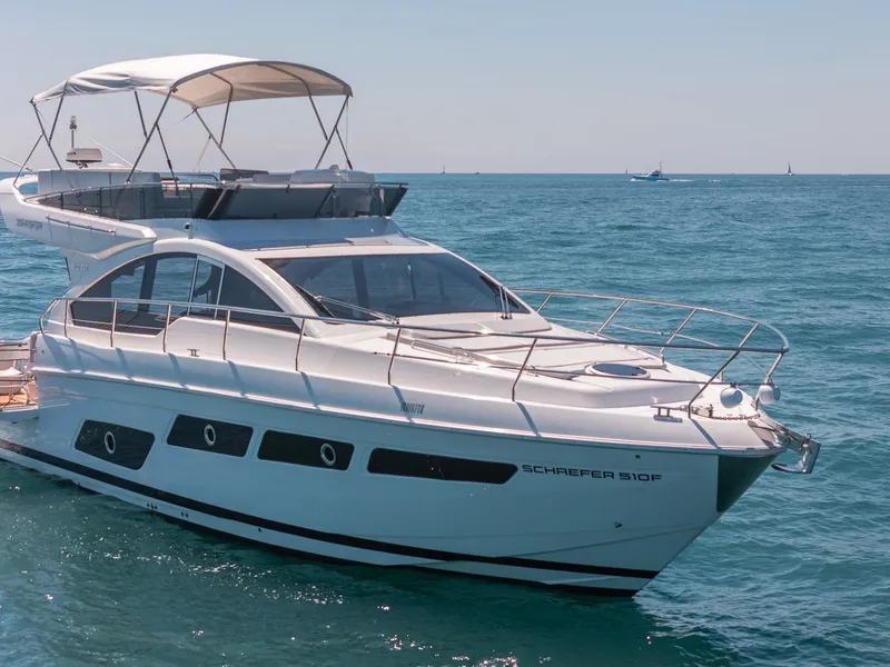 Slide: The Image of Luxury yacht Schaefer 510 GT 2023 on open sea. - 14