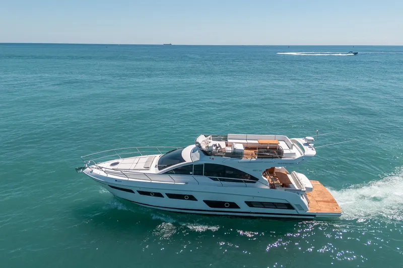 Slide: The Image of Luxury yacht Schaefer 510 GT 2023 on open sea. - 17