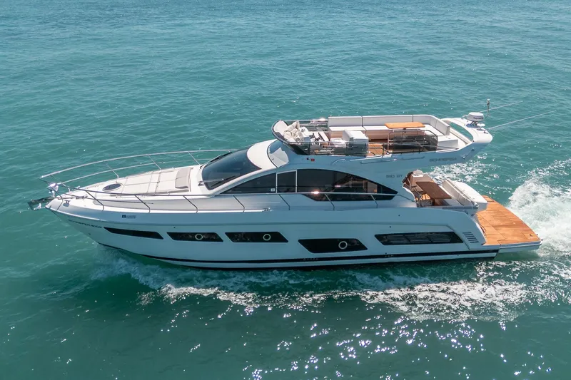 Slide: The Image of Luxury yacht Schaefer 510 GT 2023 on open sea. - 18