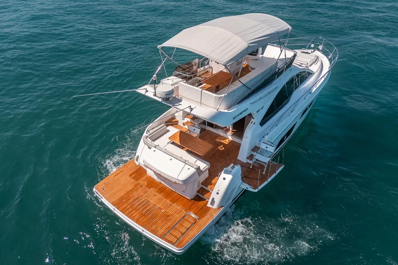 Slide: The Image of Luxury yacht Schaefer 510 GT 2023 on open sea. - 3