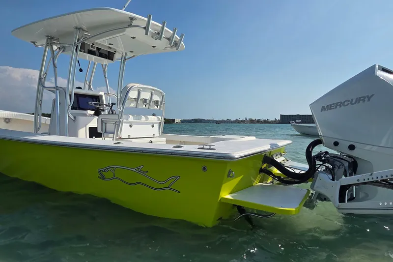 Slide: The Image of 2012 Gause Built 26 Center Console boat with Mercury engine in clear waters. - 15