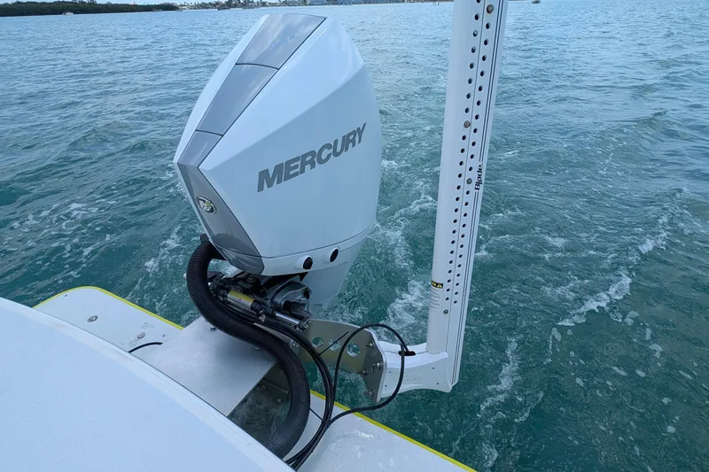 Slide: The Image of 2012 Gause Built 26 Center Console with Mercury outboard engine on water. - 21