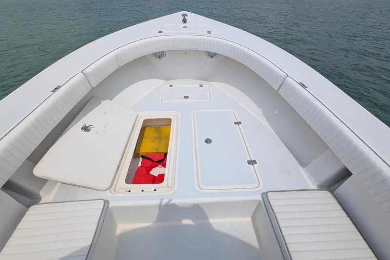Slide: The Image of 2012 Gause Built 26 Center Console boat interior with open storage compartments. - 26