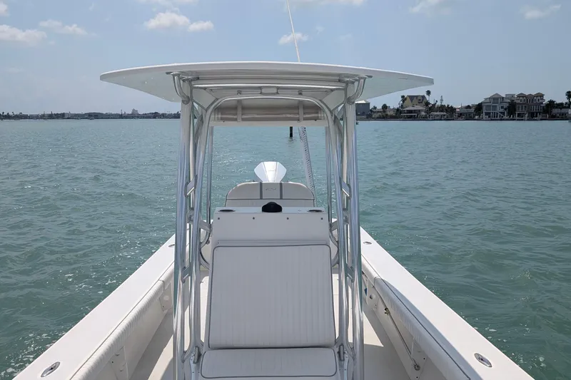 Slide: The Image of 2012 Gause Built 26 Center Console boat on calm water, clear sky background. - 29