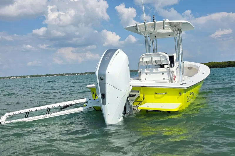 Slide: The Image of 2012 Gause Built 26 Center Console boat on water, featuring a vibrant yellow hull. - 3