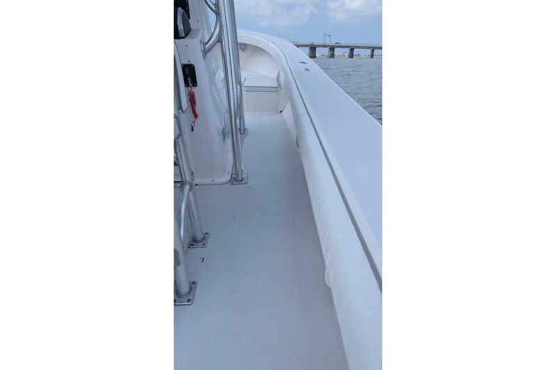 Slide: The Image of 2012 Gause Built 26 Center Console boat deck with ocean view and bridge in background. - 36
