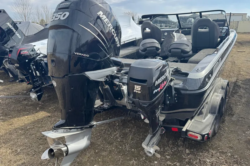 Slide: The Image of 2018 Nitro ZV21 boat with dual Mercury outboard motors on a trailer. - 3